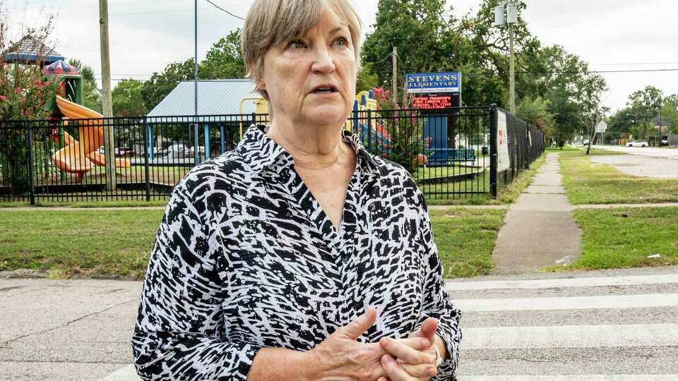 School nurse, Patricia Cook, recalls stories of her time working as a school nurse as she walks past Stevens Elementary School Thursday, Aug. 22, 2024 where she retired in May, 2024.