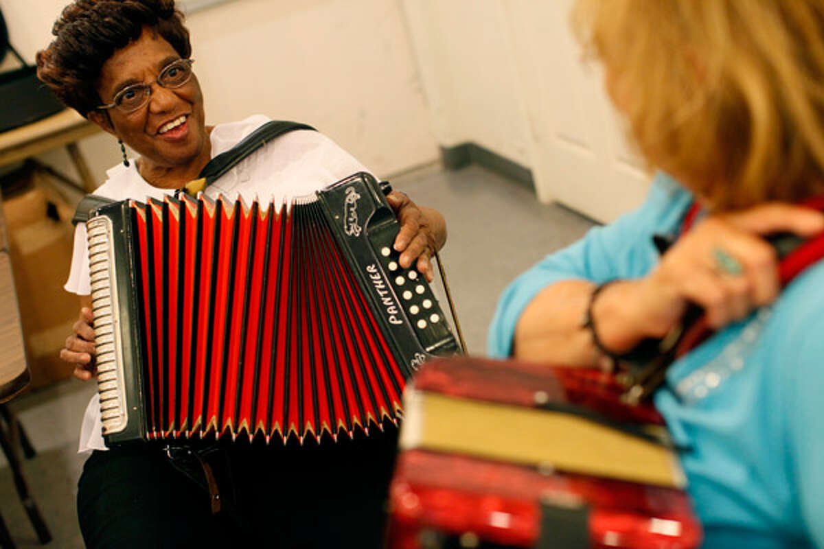 Senior citizens squeeze music from accordions