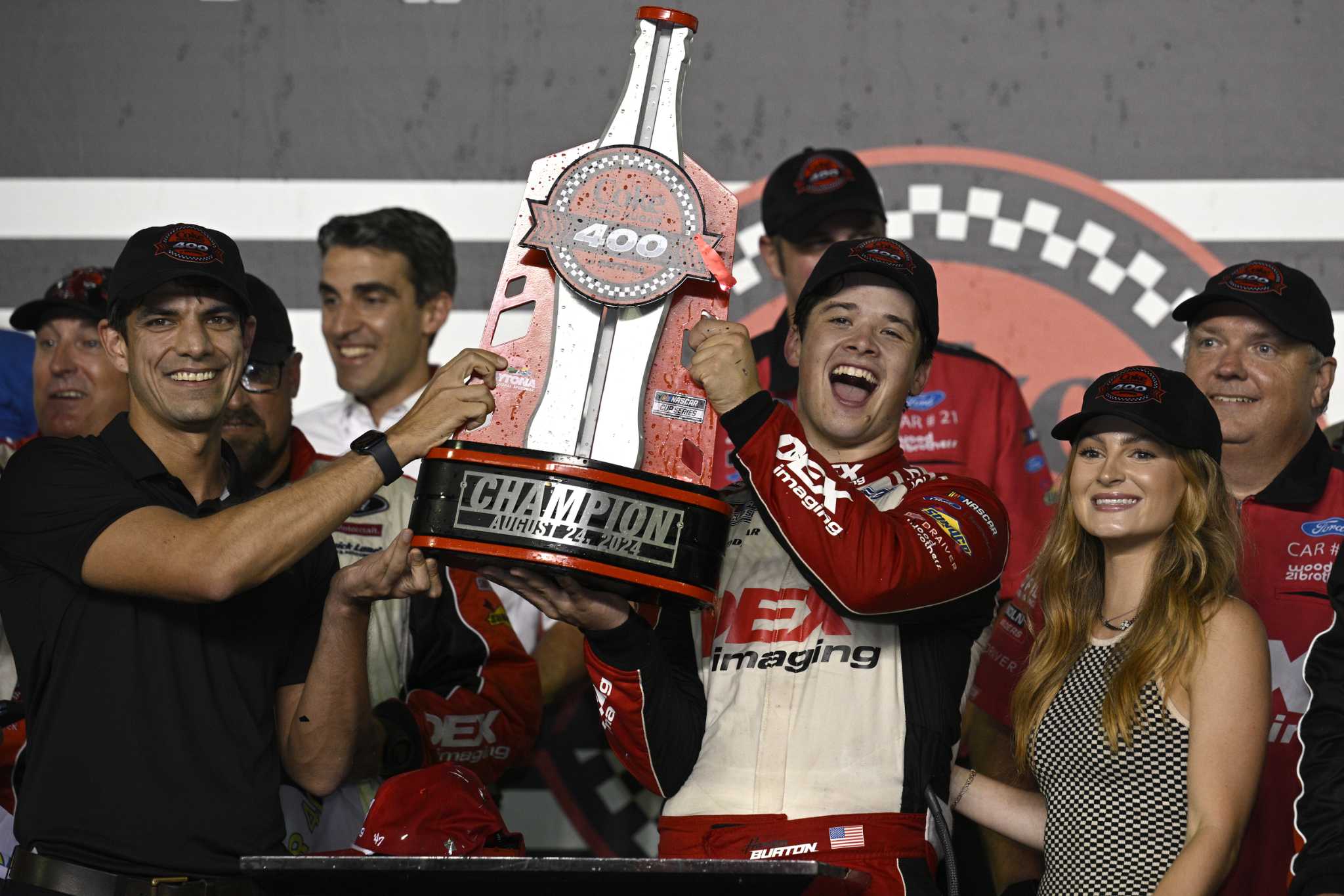 Harrison Burton wins a wild NASCAR Cup race at Daytona to secure a playoff spot that no one expected