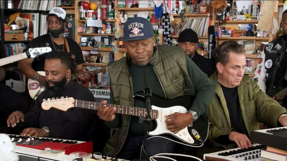 Scarface on guitar during his Tiny Desk Concert for NPR.