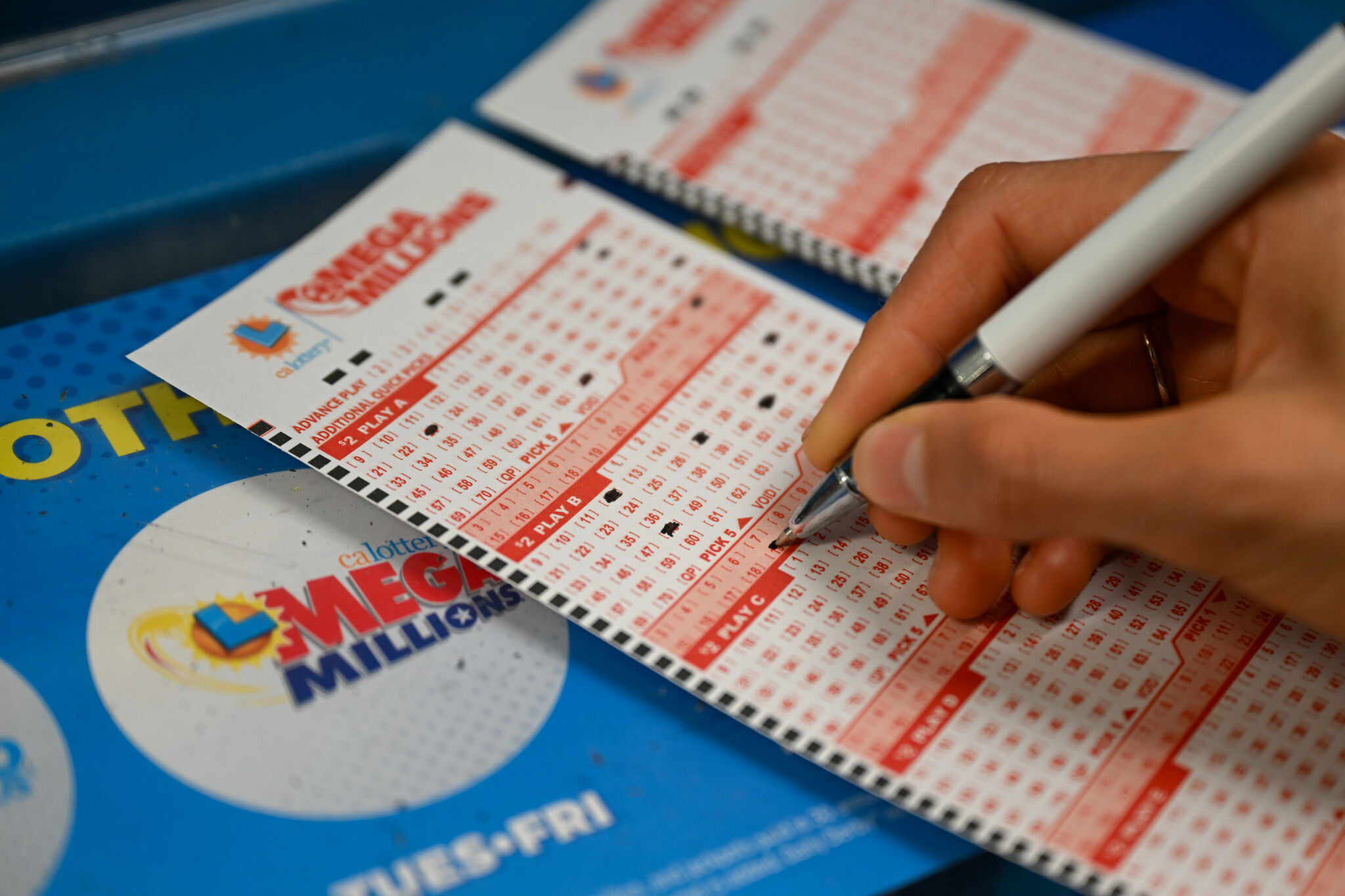 Roll it again Mega millions jackpot soars for Tuesday's drawing