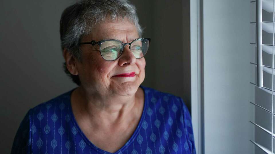 Connie Castillo stands in her new apartment at 2100 Memorial on Monday, Aug. 26, 2024 in Houston. After getting damaged during Hurricane Harvey, the new 2100 Memorial, an Houston Housing Authority affordable senior housing facility near Buffalo Bayou, is reopening Thursday.