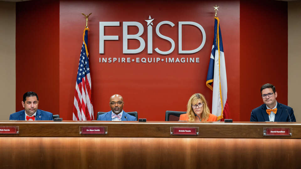 (From left to Right) Trustee Rick Garcia, Superintendent Dr. Marc Smith, President Kristin Tassin and Trustee David Hamilton attend a Fort Bend Independent School District board meeting on Monday, August 26, 2024 in Sugar Land, TX. Trustees voted 5-2 to approve a library book policy, which allows the superintendent to have sole authority to remove content from library shelves. Critics have called it the “most restrictive (policy) in the state of Texas,” and warned that the policy could result in hundreds of books being taken off Fort Bend ISD library shelves.