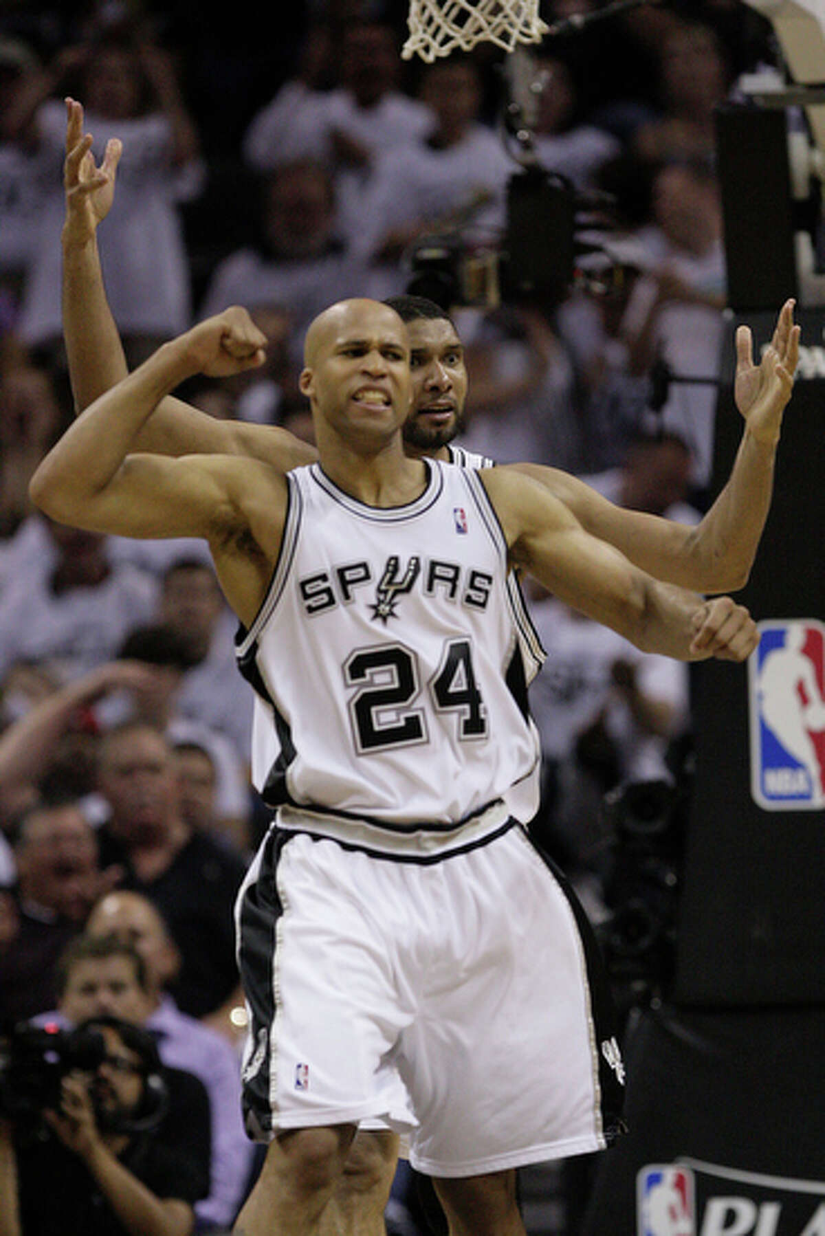 San Antonio Spurs Richard Jefferson and Tim Duncan call for a foul.