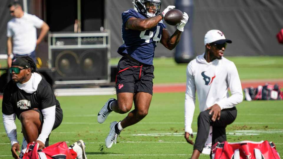 Houston Texans running back British Brooks (44) makes a catch during practice on Wednesday, Aug. 28, 2024, at Houston Methodist Training Center in Houston.