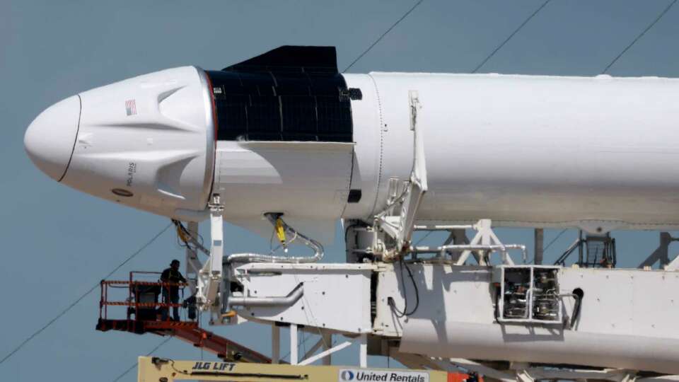 CAPE CANAVERAL, FLORIDA - AUGUST 27: Workers prepare SpaceX's Polaris Dawn Falcon 9 for another launch attempt from Launch Complex 39A of NASA's Kennedy Space Center on August 27, 2024 in Cape Canaveral, Florida. The Polaris Dawn mission was delayed by a day after a helium leak was found. The private spaceflight is backed by Jared Isaacman, the billionaire founder of payments platform Shift4. During the mission, the astronauts will attempt the first spacewalk by a private company. The launch is scheduled for Wednesday, Aug. 28, at 3:38 and has a four-hour window.