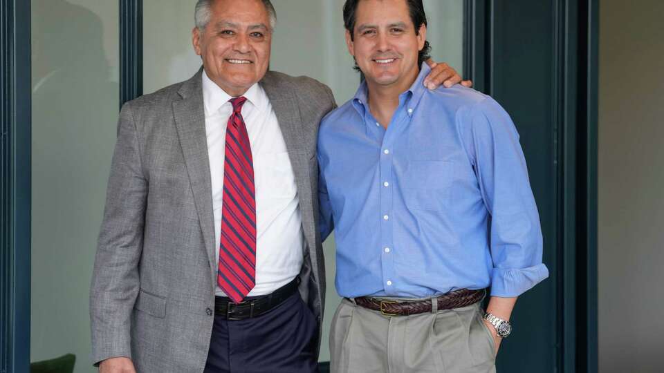 Original member of Houstons first Latino investigators, Chicano Squad, Jose Selvera Jr. and his son Sergio Selvera are photographed on Tuesday, Aug. 27, 2024 in Houston.