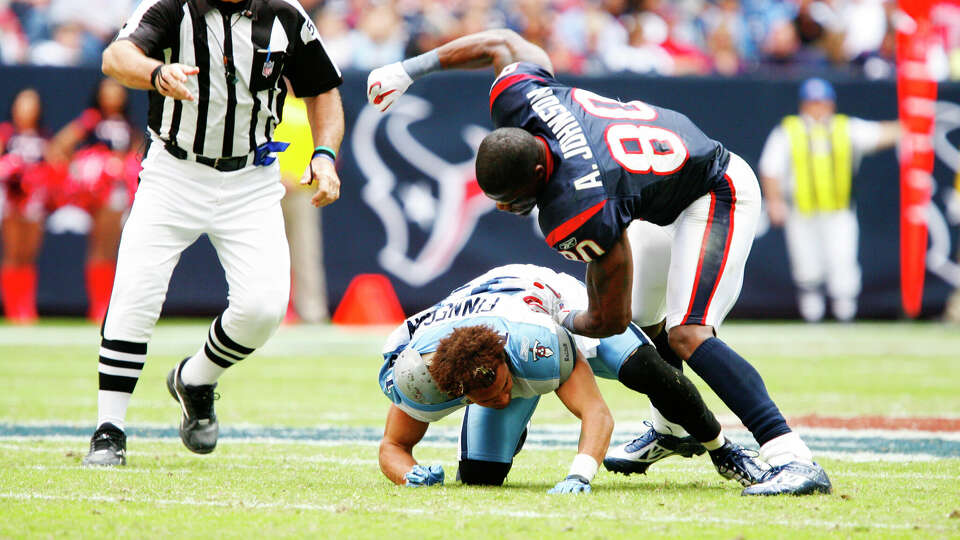 Houston Texans wide receiver Andre Johnson and Tennessee Titans defensive back Cortland Finnegan get into a fight during the game between the Tennessee Titans and the Houston Texans at Reliant Stadium in Houston. The Texans defeated the Titans 20-0.