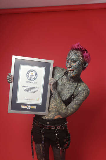 CT woman becomes world record holder for most tattoos