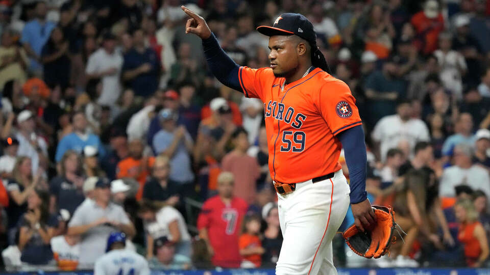 Houston Astros starting pitcher Framber Valdez (59) reacts after striking out Kansas City Royals designated hitter Nick Loftin during the seventh inning of an MLB game at Minute Maid Park on Friday, Aug. 30, 2024, in Houston.