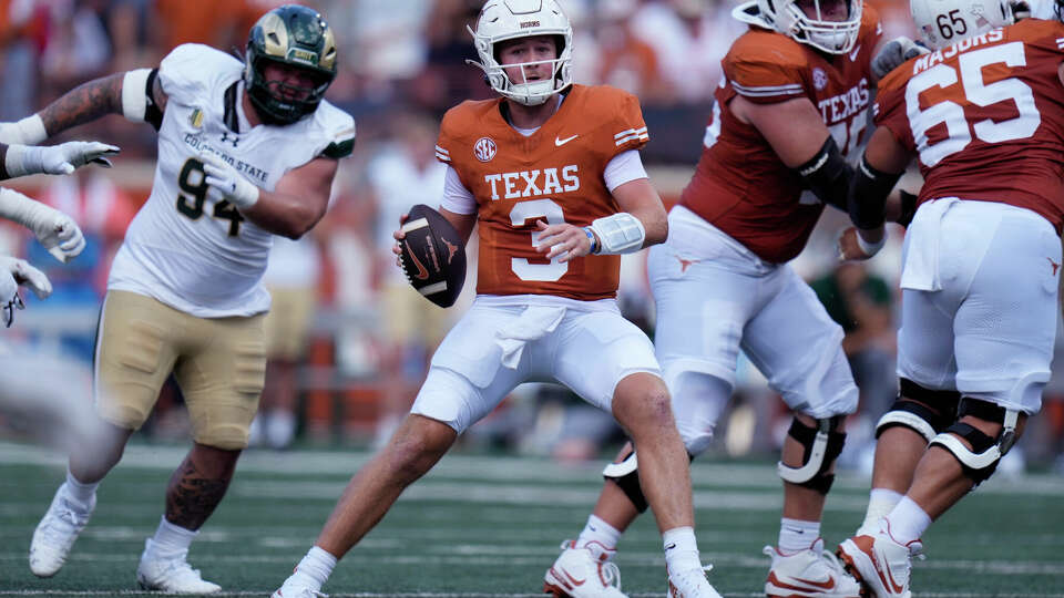 Texas quarterback Quinn Ewers (3) looks to pass against Colorado State during the first half of an NCAA college football game in Austin, Texas, Saturday, Aug. 31, 2024. (AP Photo/Eric Gay)