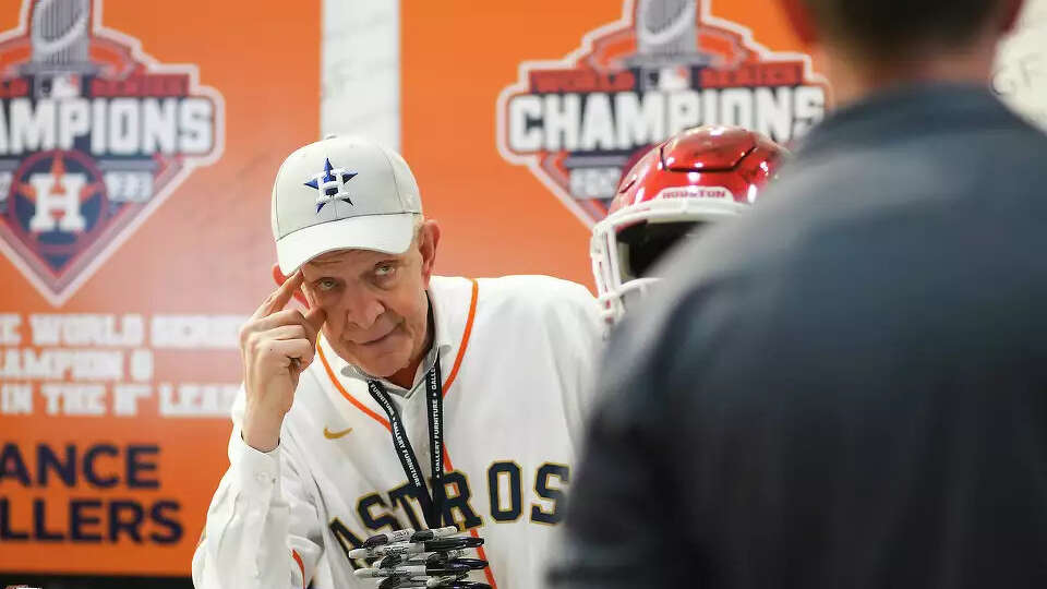 Jim “Mattress Mack” McIngvale talks to one of his employees at the front desk of Gallery Furniture on Thursday, March 30, 2023 in Houston.Thursday, March 30, 2023 in Houston. Elizabeth Conley/Staff photographer