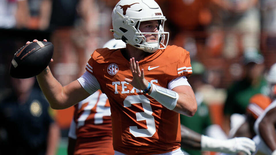 Texas quarterback Quinn Ewers (3) looks to pass against Colorado State during the first half of an NCAA college football game in Austin, Texas, Saturday, Aug. 31, 2024. (AP Photo/Eric Gay)