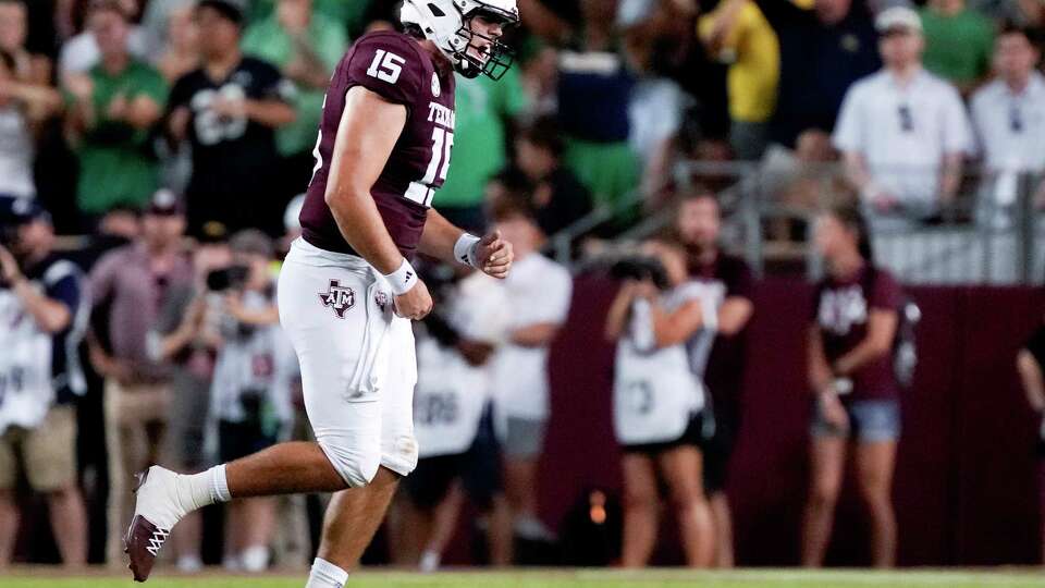 Texas A&M Aggies quarterback Conner Weigman (15) reacts after throwing his second interception during the second quarter of a non-conference college football game at Kyle Field, Saturday, Aug. 31, 2024, in College Station.