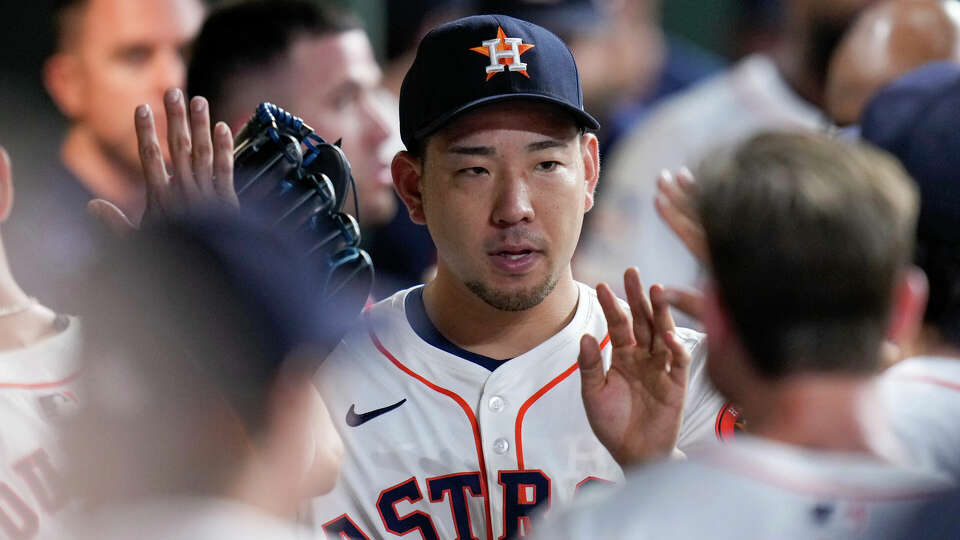 Houston Astros starting pitcher Yusei Kikuchi celebrates in the dugout after completing the seventh inning against the Kansas City Royals in a baseball game Saturday, Aug. 31, 2024, in Houston. (AP Photo/Eric Christian Smith)