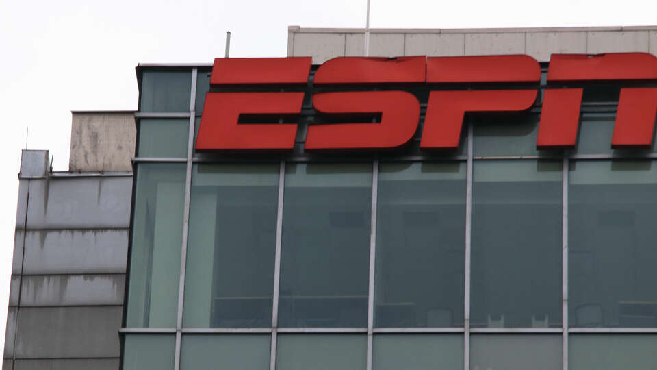 The logo of the television network ESPN is seen outside its facilities in Mexico City, Mexico, on August 31, 2024. 