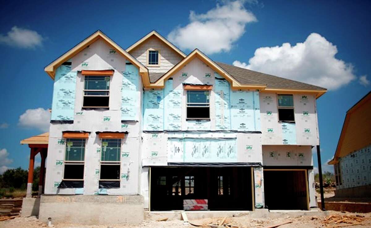 Seen is a Lennar home under construction at the Preserve at Indian Springs in the Northeast Side. The homebuilder is the first large national builder to agree to build all of its area homes to specifications of the Build San Antonio Green program.