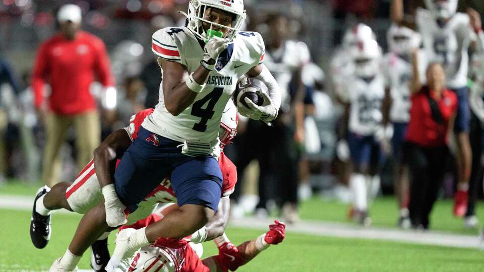 Atascocita wide receiver CJ Toney (4) gets past Katy defensive back Jacob Hilton (6) during the second quarter of a non-district high school football game at Legacy Stadum, Friday, Sept. 6, 2024, in Katy.