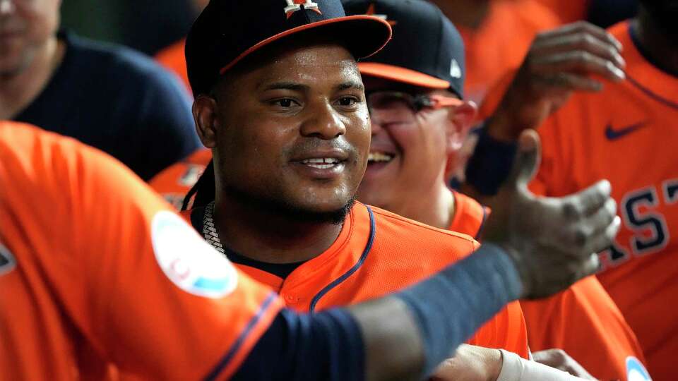 Houston Astros starting pitcher Framber Valdez (59) celebrates with teammates in the dugout during the seventh inning of an MLB game at Minute Maid Park on Friday, Sept. 6, 2024, in Houston.