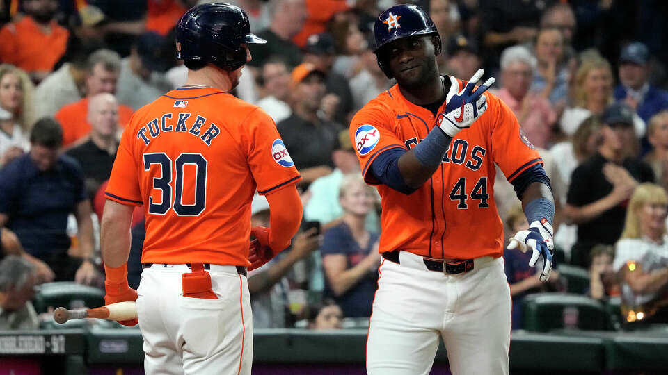 Houston Astros' Yordan Alvarez (44) celebrates his second home run of the night with Kyle Tucker (30) during the sixth inning of an MLB game at Minute Maid Park on Friday, Sept. 6, 2024, in Houston.