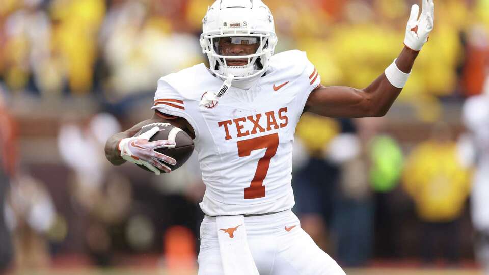 ANN ARBOR, MICHIGAN - SEPTEMBER 07: Isaiah Bond #7 of the Texas Longhorns celebrates after a reception during the first quarter against the Michigan Wolverines at Michigan Stadium on September 07, 2024 in Ann Arbor, Michigan.