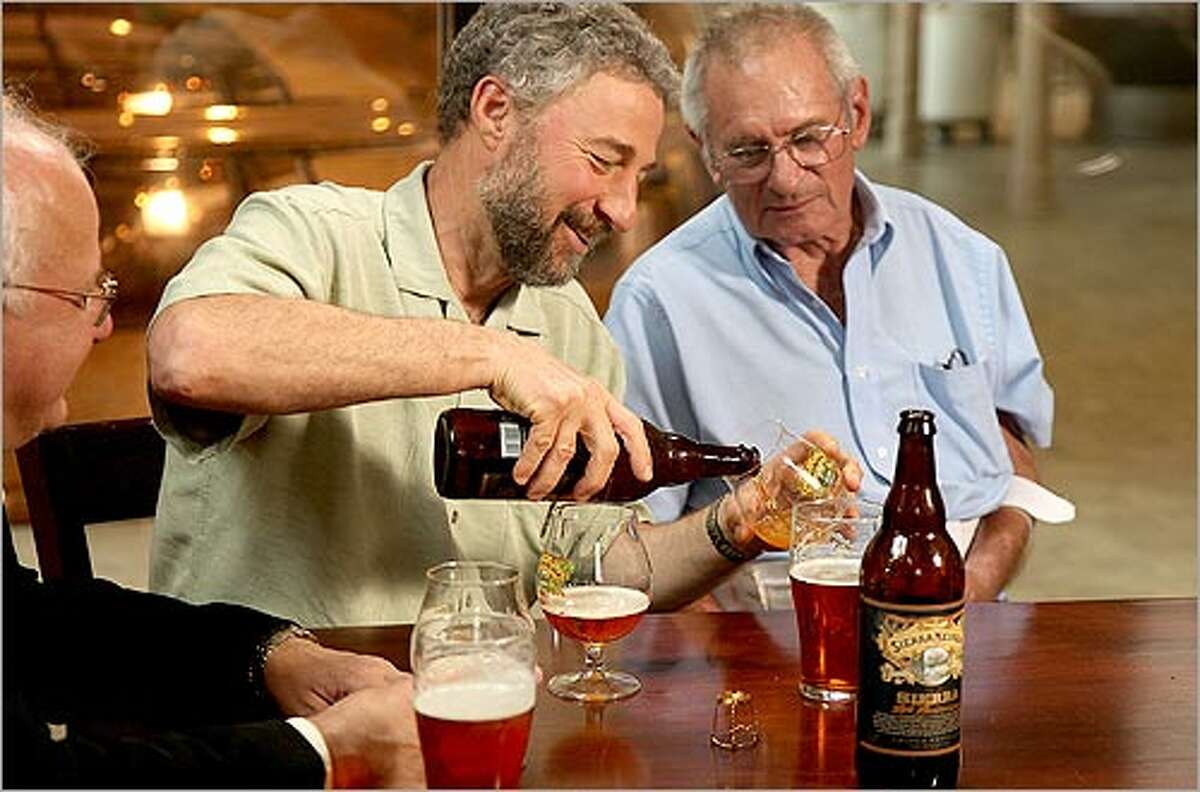 Sierra Nevada founder Ken Grossman (left) visit with Jack McAuliffe at the Sierra Nevada brewery, which is celebrating the brewery's 30th anniversary.