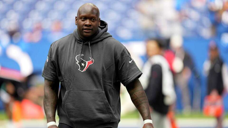 Houston Texans offensive tackle Laremy Tunsil walks onto the field before an NFL football game against the Indianapolis Colts Sunday, Sept. 8, 2024, in Indianapolis.