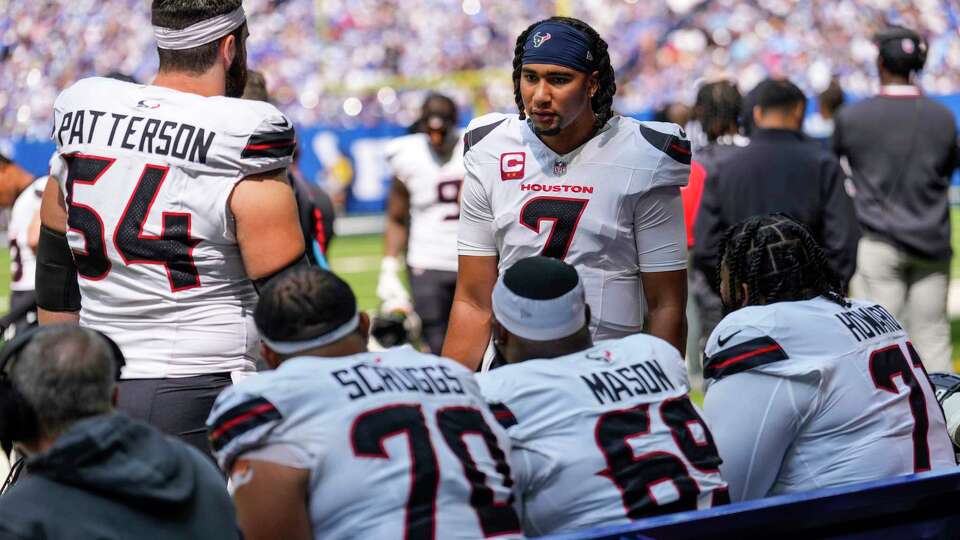 Houston Texans quarterback C.J. Stroud (7) talks to the offensive line on the bench during an NFL football game against the Indianapolis Colts on Sunday, Sept. 8, 2024, in Indianapolis.