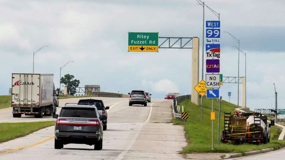 Vehicles drive on the entrance ramp to the Grand Parkway on Thursday, Sept. 12, 2024 in Spring.