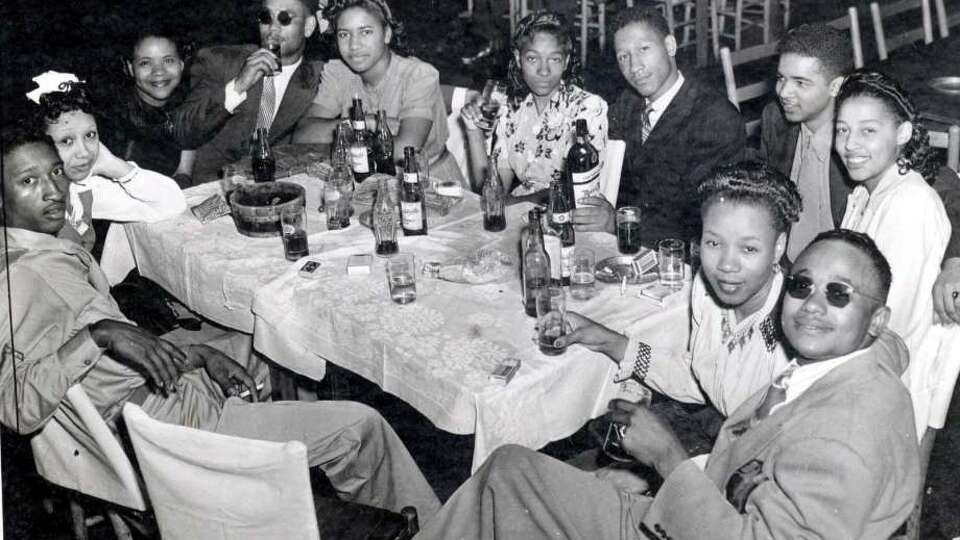 A group of friends gathers at the Eldorado Ballroom in Houston in its mid-20th century heyday. It's from the documentary 'When Houston Had the Blues'