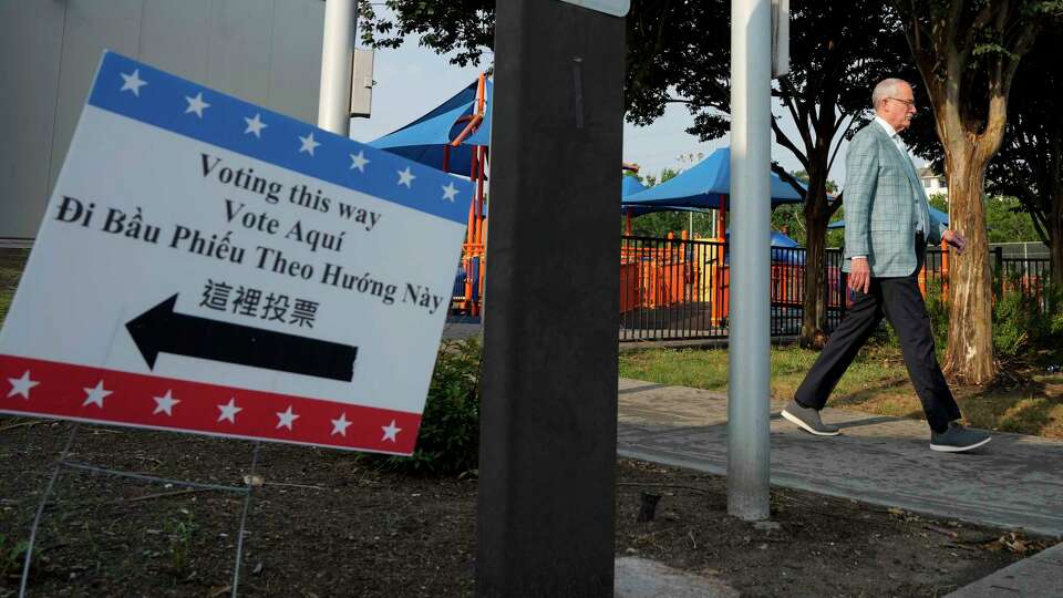 A voter leaves after voting Tuesday, May 28, 2024 at West Gray Multiservice Center in Houston.