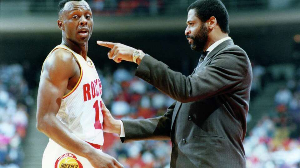 01/25/1990 - Houston Rockets coach Don Chaney, right, makes a point with Mitchell Wiggins (15) during the second half against the Los Angeles Clippers in the Summit.