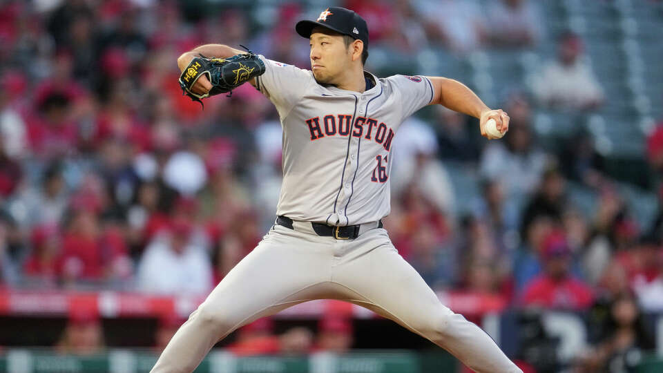 Houston Astros starting pitcher Yusei Kikuchi throws during the first inning of a baseball game against the Los Angeles Angels in Anaheim, Calif., Friday, Sept. 13, 2024. (AP Photo/Ashley Landis)