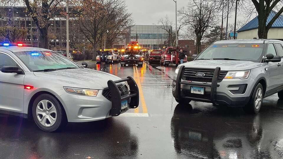 A file photo of two Connecticut State Police cruisers. Police said a Waterbury man died after his motorcycle crashed into another motorcycle on Route 34 in New Haven Friday night.