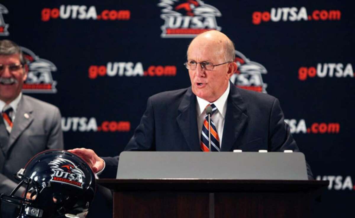 Coach Larry Coker, shown at his introductory news conference in March 2009, and UTSA will have to re-evaluate the program's plans to join the Football Bowl Subdivision because of a rule change instituted by the Southland Conference.