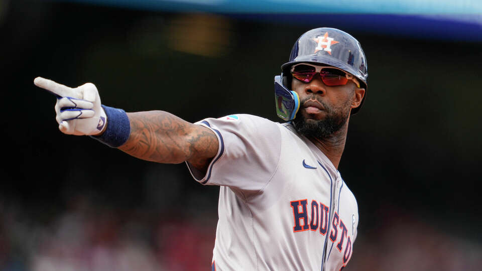 Houston Astros' Jason Heyward celebrates after hitting a home run during the third inning of a baseball game against the Los Angeles Angels in Anaheim, Calif., Sunday, Sept. 15, 2024. (AP Photo/Ashley Landis)