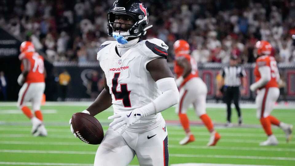 Houston Texans cornerback Kamari Lassiter (4) reacts after intercepting a pass by Chicago Bears quarterback Caleb Williams during the fourth quarter of an NFL football game at NRG Stadium, Sunday, Sept. 15, 2024, in Houston.