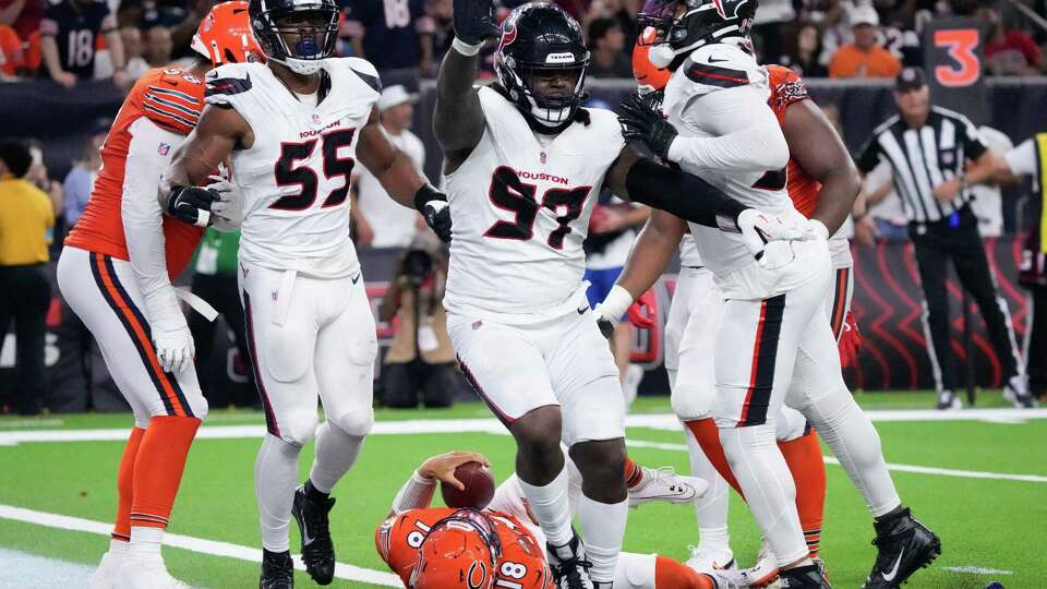 Houston Texans defensive end Mario Edwards Jr. (97) reacts after sacking Chicago Bears quarterback Caleb Williams (18) during the fourth quarter of an NFL football game at NRG Stadium, Sunday, Sept. 15, 2024, in Houston.