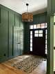 Board and batten is a classic wall design style that combines large boards with more narrow strips, says Erika Gallagher, interior designer and co-owner of Plum & Crimson Fine Interior Design in Saratoga Springs.