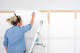 A DIY board and batten wall treatment using strips of medium density fiberboard (MDF) is an easy and inexpensive way to add depth to a wall.