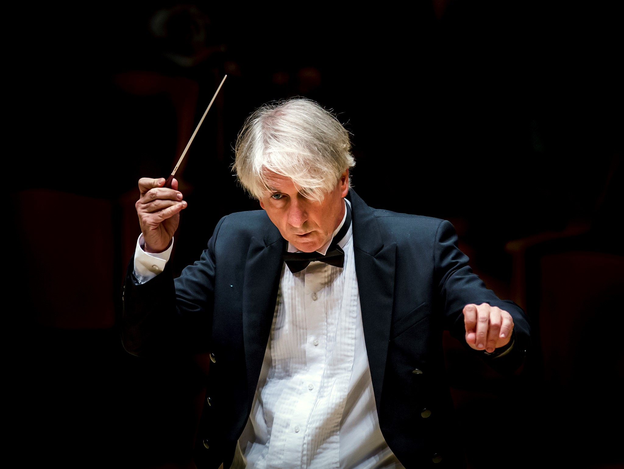 Bob Weir performing with a conductor and orchestra