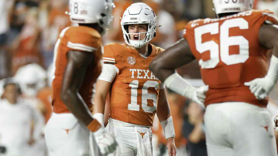 AUSTIN, TEXAS - SEPTEMBER 14: Arch Manning #16 of the Texas Longhorns reacts at the line of scrimmage in the second half against the UTSA Roadrunners at Darrell K Royal-Texas Memorial Stadium on September 14, 2024 in Austin, Texas.