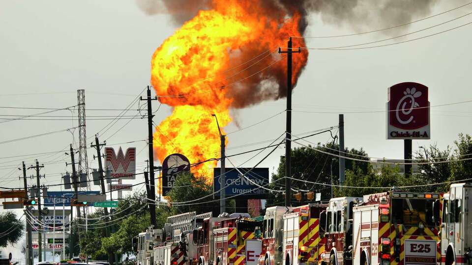 Emergency vehicles line Spencer Highway responding to a pipeline fire near Spencer and Summerton on Monday, Sept. 16, 2024 in La Porte. The fire caused road closures and shelter-in-place advisories Monday afternoon in the area, with evacuations to homes and businesses in the immediate area near the fire site.