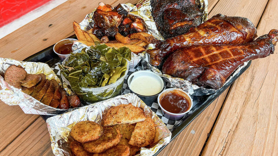 Fried green tomatoes, sausage, collard greens, rib tips, jerk chicken, turkey legs at Southern Q BBQ