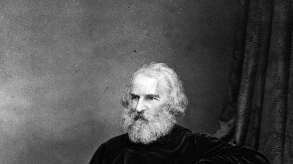 ADVANCE FOR WEEKEND EDITIONS, SEPT. 14-17--American poet Henry Wadsworth Longfellow sits for a portrait in the Paris studio of photographer Adam Salomon in this photo dated 1869. Longfellow, in his time an international celebrity and enormously popular poet in the United states, retains a loyal following who still think he can speak to readers of the 21st century. (AP Photo/Adam Salomon via National Park Service)