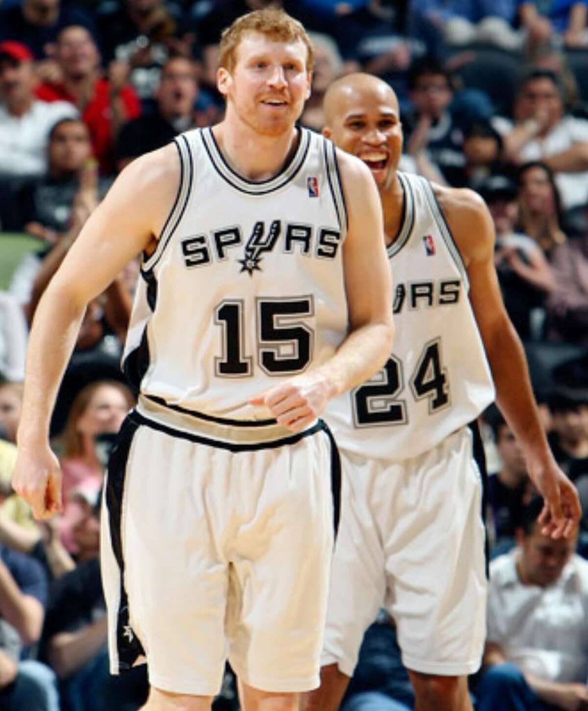 Matt Bonner (left) and teammate Richard Jefferson were all smiles after Bonner scored on a shot from behind the backboard against the Clippers in March at the AT&T Center.