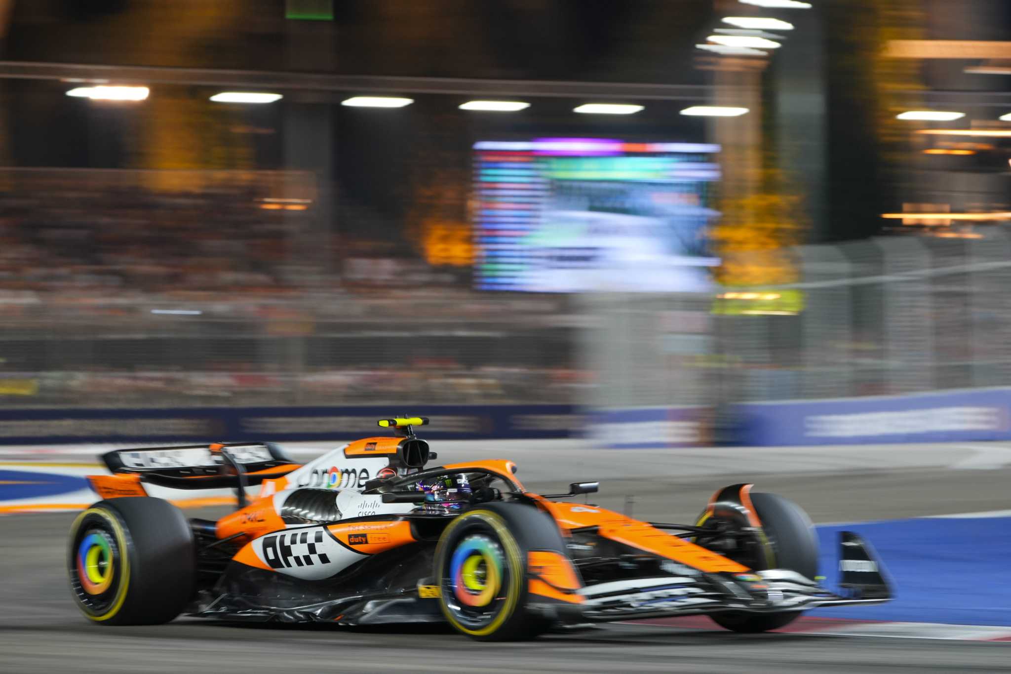 Lando Norris cruises to victory in the Singapore Grand Prix to cut Max