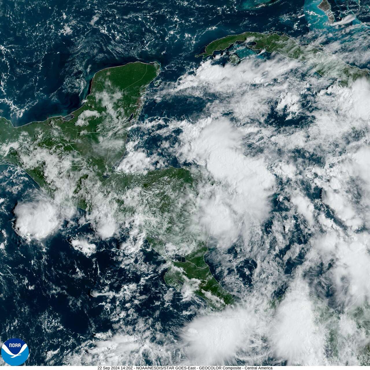 Scattered thunderstorms are seen over Central America Sunday from Space. This area is where the next named tropical system could form later this week.