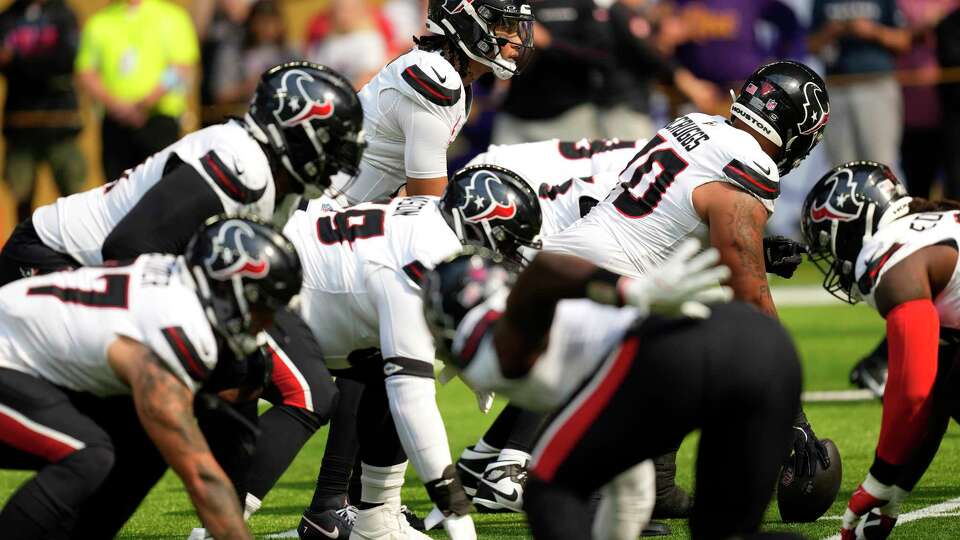 Houston Texans quarterback C.J. Stroud lines up under center as he and the offense warm up before an NFL football game against the Minnesota Vikings Sunday, Sept. 22, 2024, in Minneapolis, Minn.