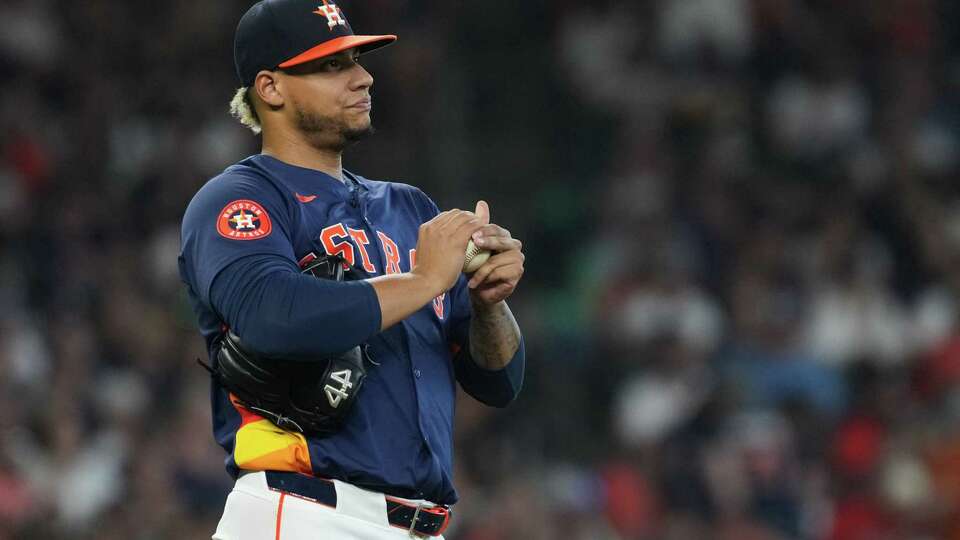 Houston Astros pitcher Bryan Abreu (52) reacts after giving up a sac-fly to Los Angeles Angels’ Nolan Schanuel to tie the game 4-4 during the seventh inning of an MLB baseball game at Minute Maid Park, Sunday, Sept. 22, 2024, in Houston.